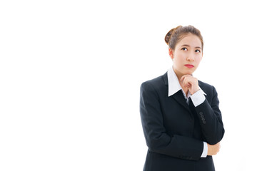 Young Asian businesswoman wearing in black suit and white t-shirt , crossing her arms and thinking isolated on white background