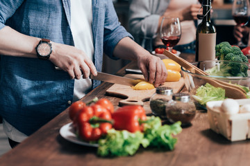 man cooking vegetable salad