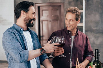 men drinking wine
