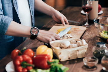 man cooking vegetable salad