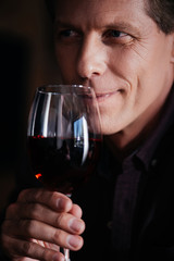 man drinking wine