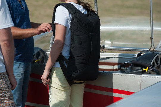 Woman In Glider Waiting For Flight