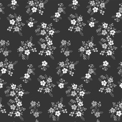 Floral seamless pattern  in monochrome color on a dark background