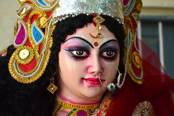 Artisan of West Bengal making clay idol of Godess Durga ahed of Durga festival