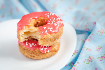 Puff cronuts with pink glaze