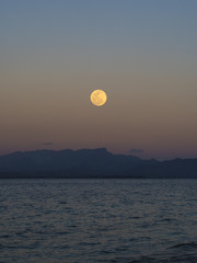 View of the Moon setting from Bounty Island, Fiji