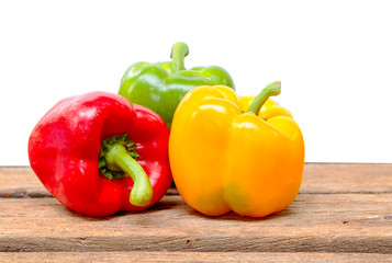 Colorful  peppers on wooden background