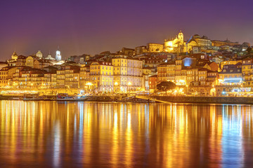 Fototapeta na wymiar Panorama old city Porto and river Duoro at sunset