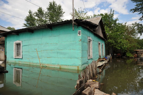 Flood. The river Ob, which emerged from the shores, flooded the outskirts of the city.