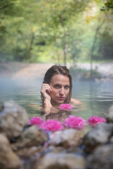 Young Woman Taking a Bath In Hot Spring Outdoor Maibachl Villach Austria