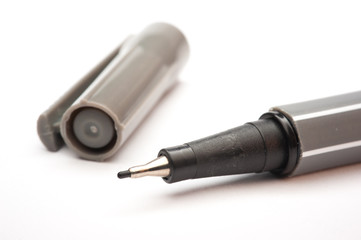 Colored marker pens on white background.