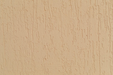 Wall covered beige plaster, background, texture