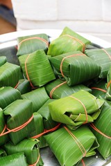 Sour pork wrapped in banana leaves delicious