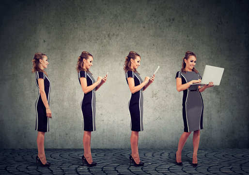 Modern digital devices and technology progress concept. Business woman using mobile phone, tablet and laptop computer