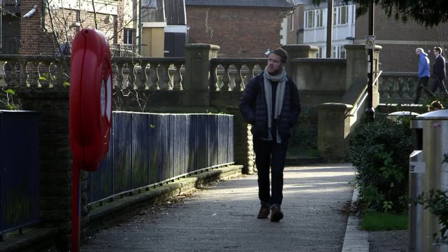Young Man In Casual Clothing Walking To Work Shot On R3D