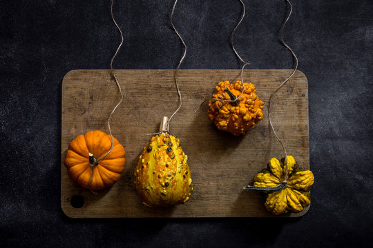 Pumpkins on dark table