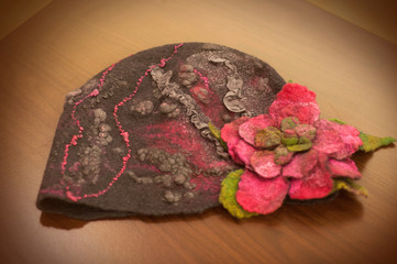 A beautiful felting wool hat with flower.