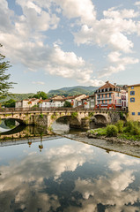 Fototapeta na wymiar View of the river and bridge in Saint-Girons, France