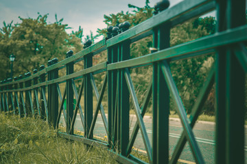 Fence of metal along the bridge