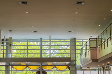 Ceiling and glass walls and  and mezzanine in the lobby.