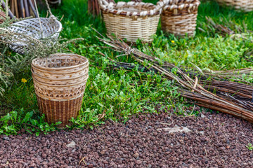 Set of wicker baskets on the ground of a farm