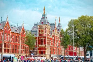 Foto op Plexiglas Amsterdam Centraal Station. Het is het centraal station van Amsterdam © arkanto