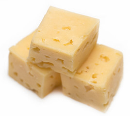 Cube of cheese isolated on a white background
