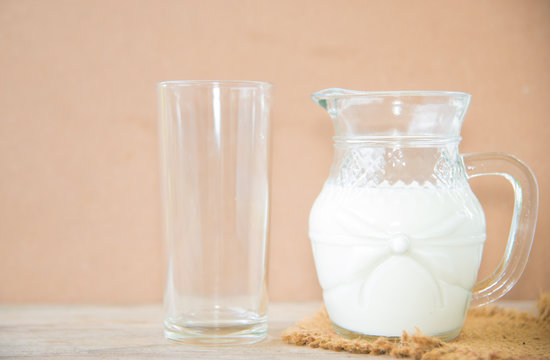 milk in glass on table.