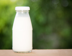 milk in glass on table.