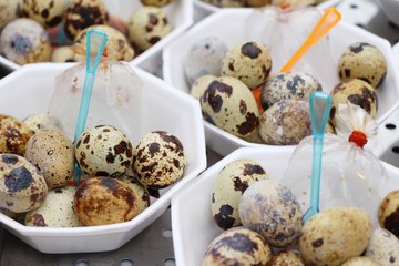 Quail eggs with sauce in street food