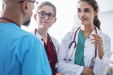 Medical team standing on talking