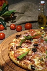 Delicious fresh pizza served on wooden table