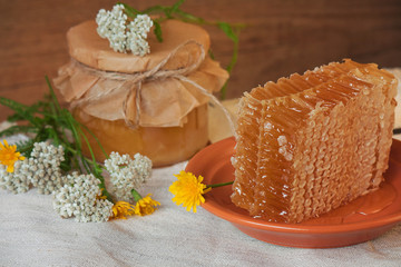 Honey cells and meadow flowers.