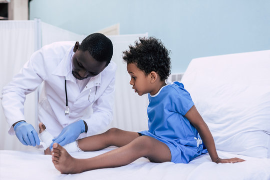 african american doctor taking care of patient