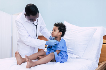 Fototapeta premium african american doctor and little boy
