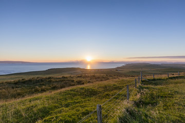 Late evening summer sunset in Totscore on the Isle of Skye in Scotland.