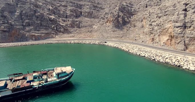 boat and car Musandam Sultanate of Oman