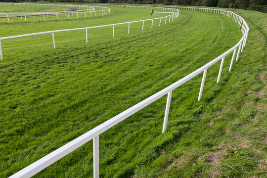 Horse race track corner barrier fence