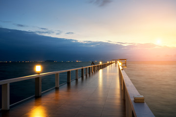 Fototapeta premium Wooden pier between sunset in Phuket, Thailand. Summer, Travel, Vacation and Holiday concept.