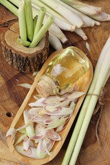 Lemongrass essential oil with fresh slice lemongrass