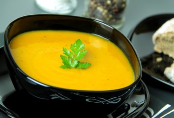 Warm tasty autumn creamy pumpkin soup