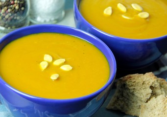 Warm tasty autumn creamy pumpkin soup