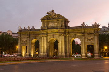 Fototapeta na wymiar The Alcala Door (Puerta de Alcala) is a one of the ancient doors of the city of Madrid Spain.