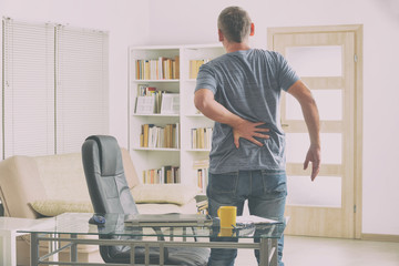 Man suffering from low back pain