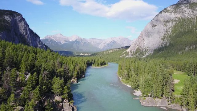 Bow River among Rockies Mountains in Banff National Park, Canada