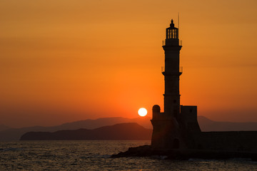 Picture of lighthouse sihoulette in the sunset