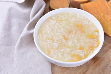 Simple and healthy porridge cooked with sweet potato. For diet and nutrition, healthy eating and lifestyle concepts.