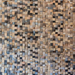 Wooden background made of various woods of scraps of barrels, quadratini