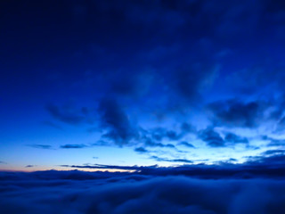 blur image - blue sky with cloud looking from the top of Fuji mountain in Japan at sunrise in the morning