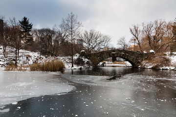 Gapstow Bridge in New York's Central park on a frozen, snowy winters day